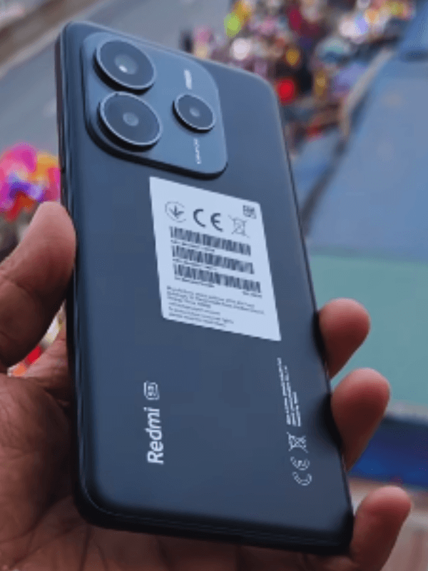 The back side of the Redmi Note 14 5G reflects why many ask, is Redmi a good smartphone for students—this stylish and affordable Xiaomi device is often considered one of the best for student use.