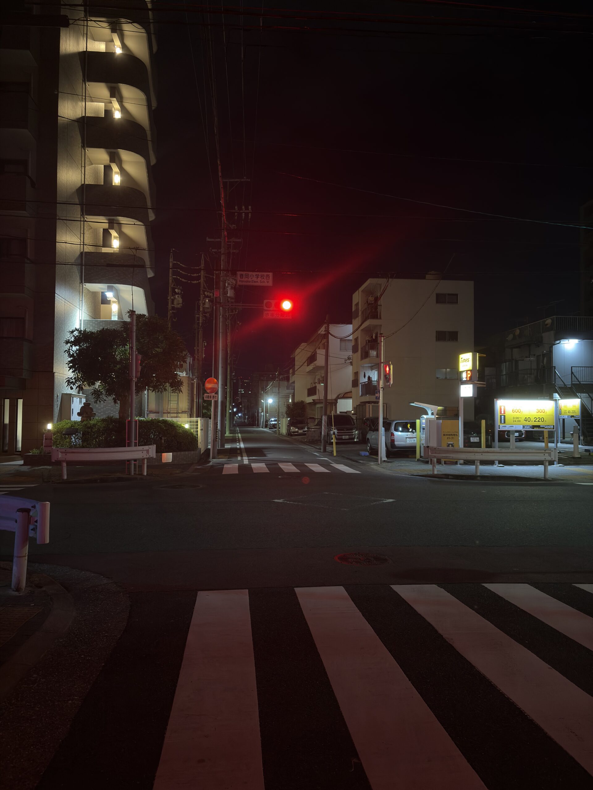 Night street scene captured with the iPhone 16 48MP main camera